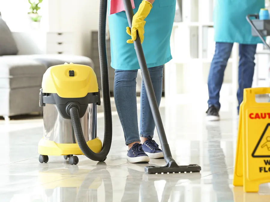 CleanerWA team cleaning the floor of a Perth office