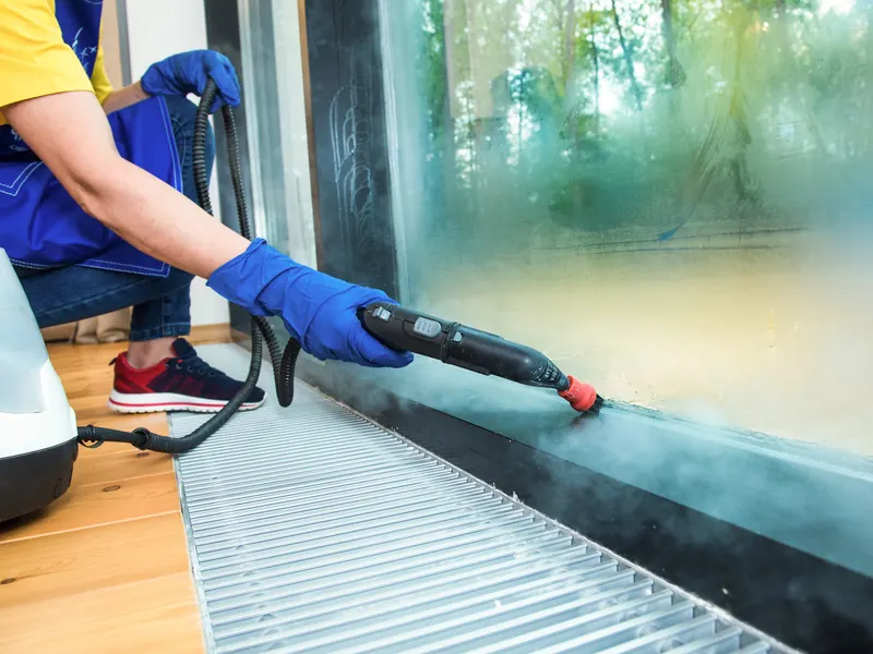 Cleaning window tracks and glass during a vacate clean